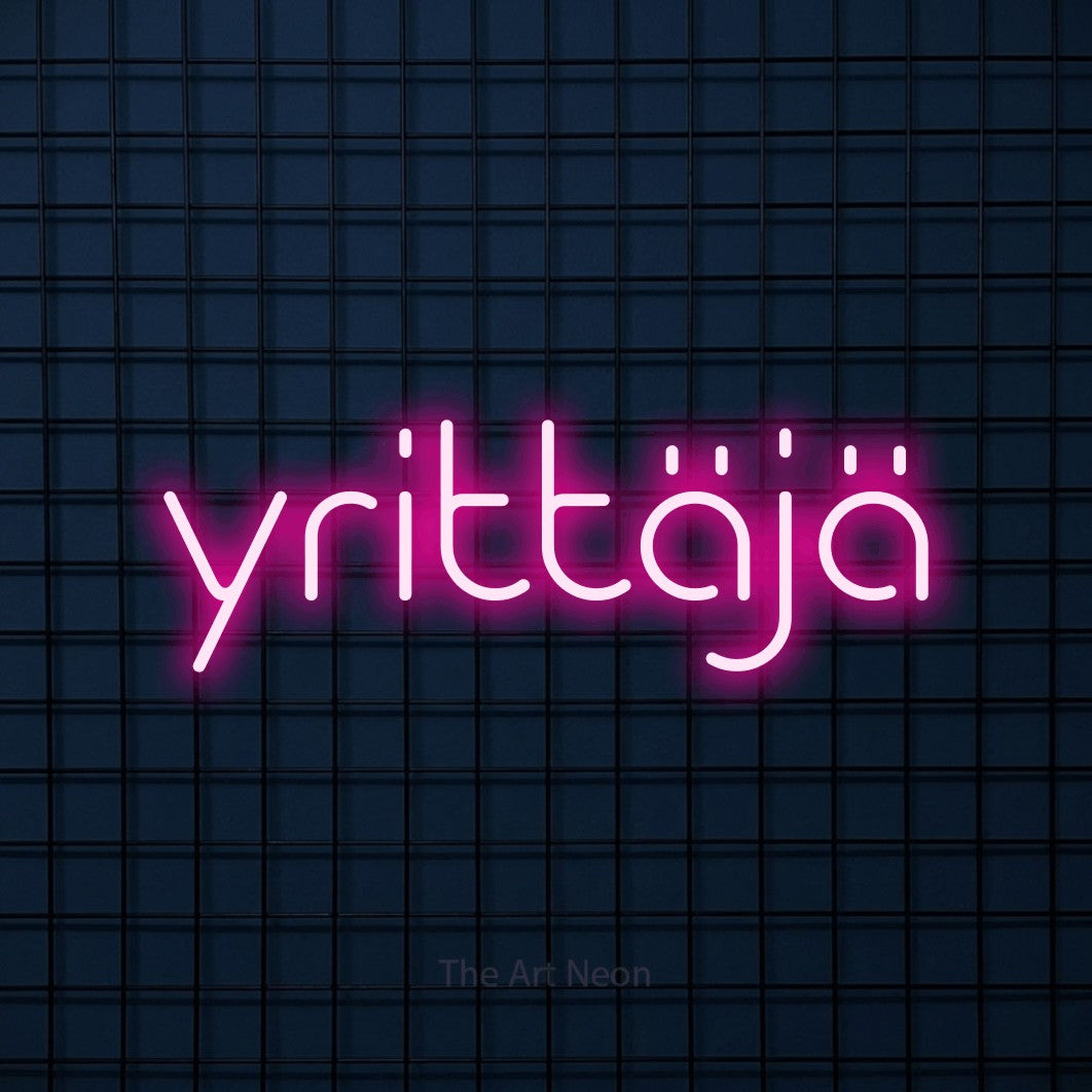 LED neon sign reading “yrittäjä”, arranged in a single line.