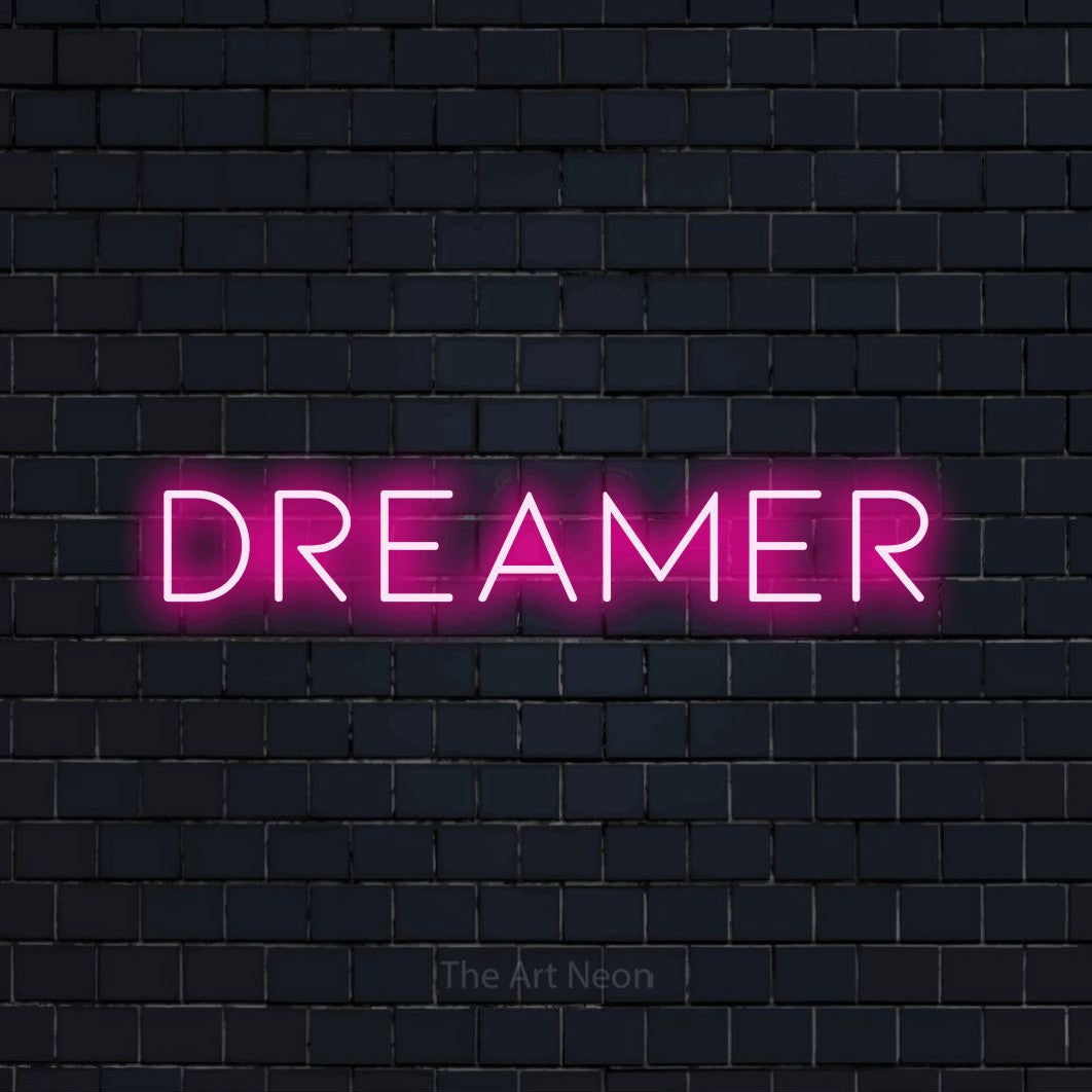 LED neon sign reading “Dreamer”, arranged in a single line.