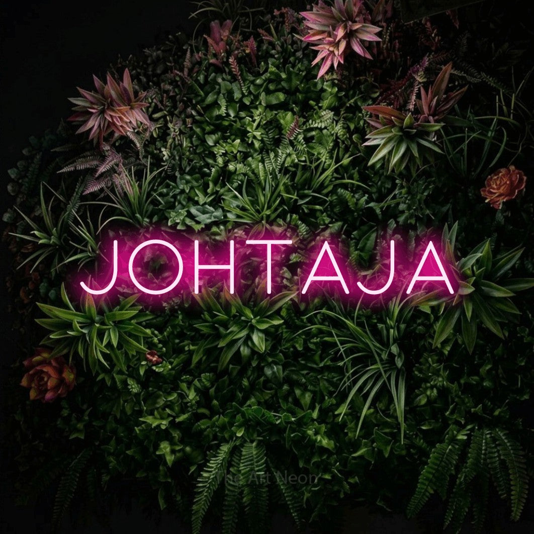 LED neon sign reading “Johtaja”, arranged in a single line.