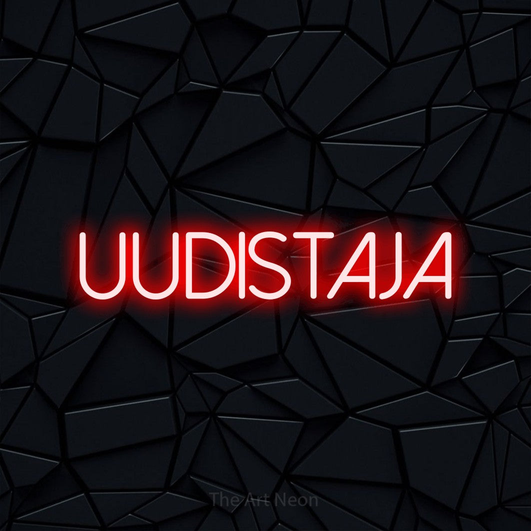 LED neon sign reading “UUDISTAJA”, arranged in a single line.