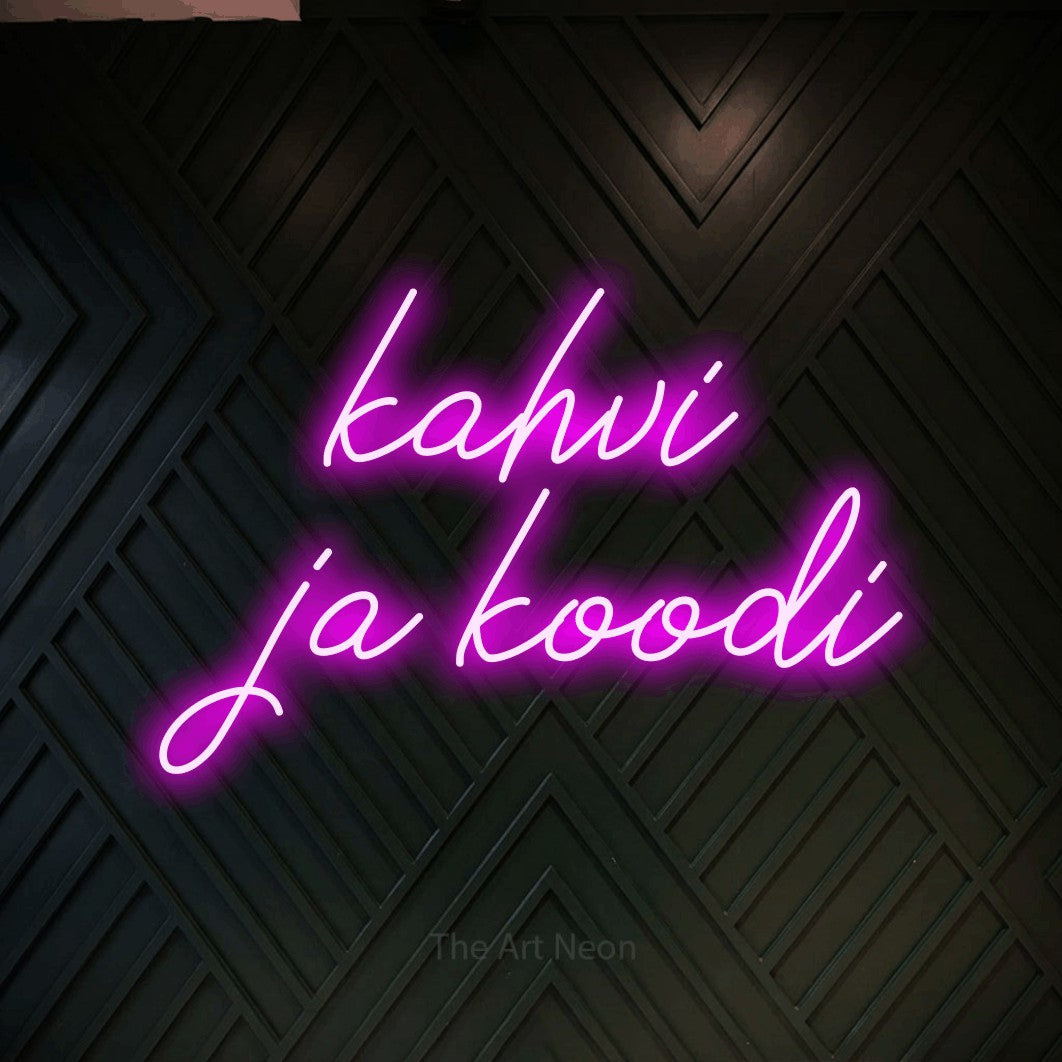LED neon sign reading “kahvi ja koodi”, arranged in 2 lines.