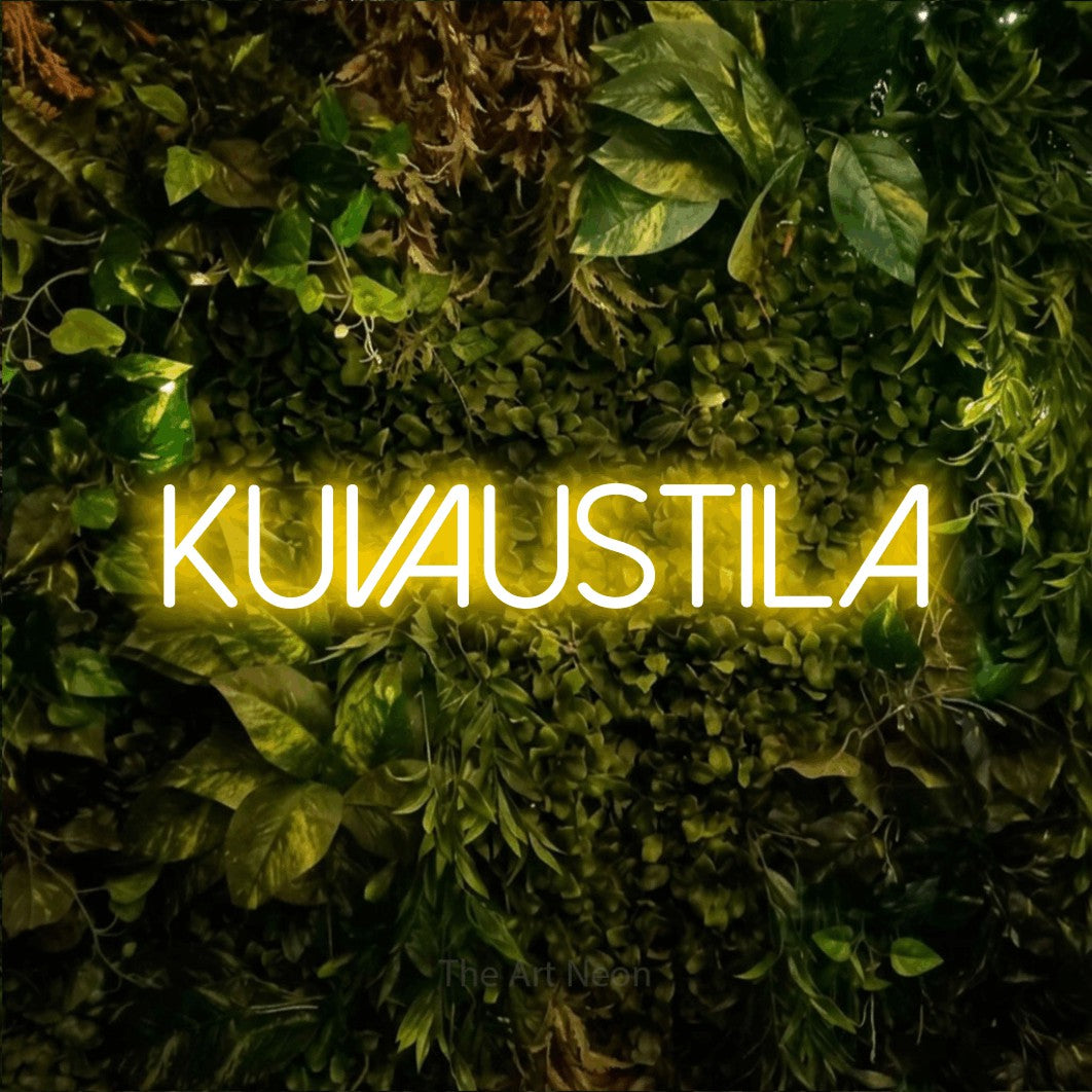LED neon sign reading “Kuvaustila”, arranged in a single line.