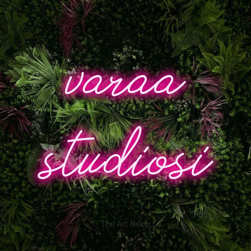 LED neon sign reading “varaa studiosi”, arranged in 2 lines.