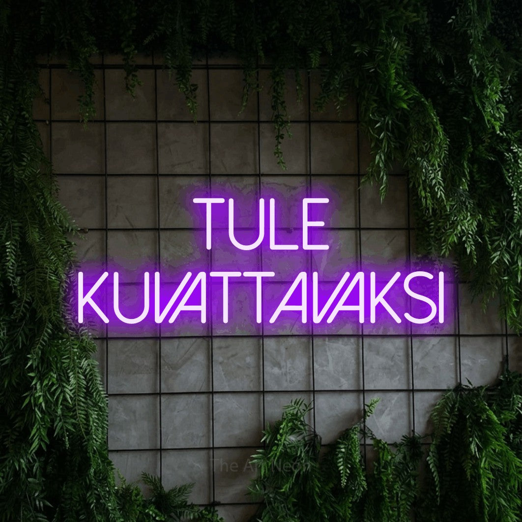 LED neon sign reading “TULE KUVATTAVAKSI”, arranged in 2 lines.