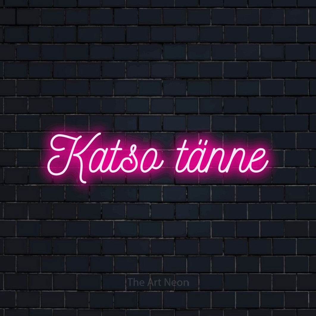 LED neon sign reading “Katso tänne”, arranged in a single line.