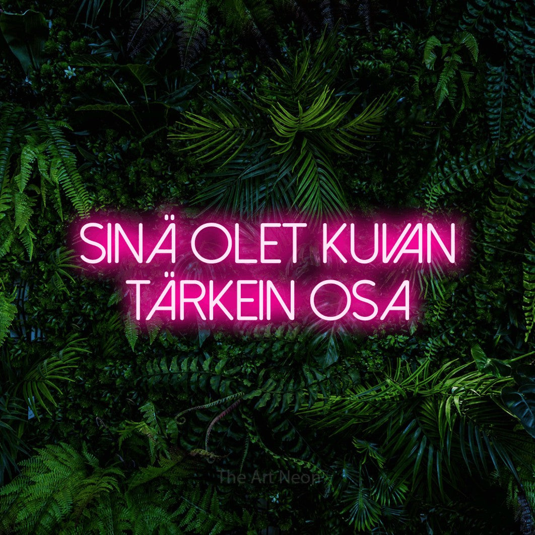 LED neon sign reading “Sinä olet kuvan tärkein osa”, arranged in 2 lines.