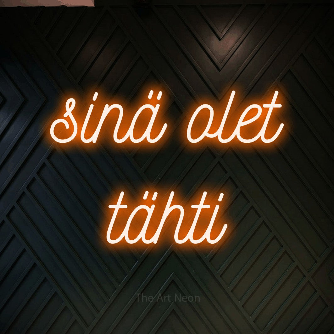 LED neon sign reading “sinä olet tähti”, arranged in 2 lines.