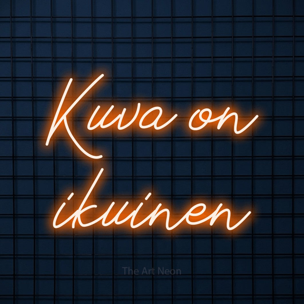 LED neon sign reading “Kuva on ikuinen”, arranged in 2 lines.
