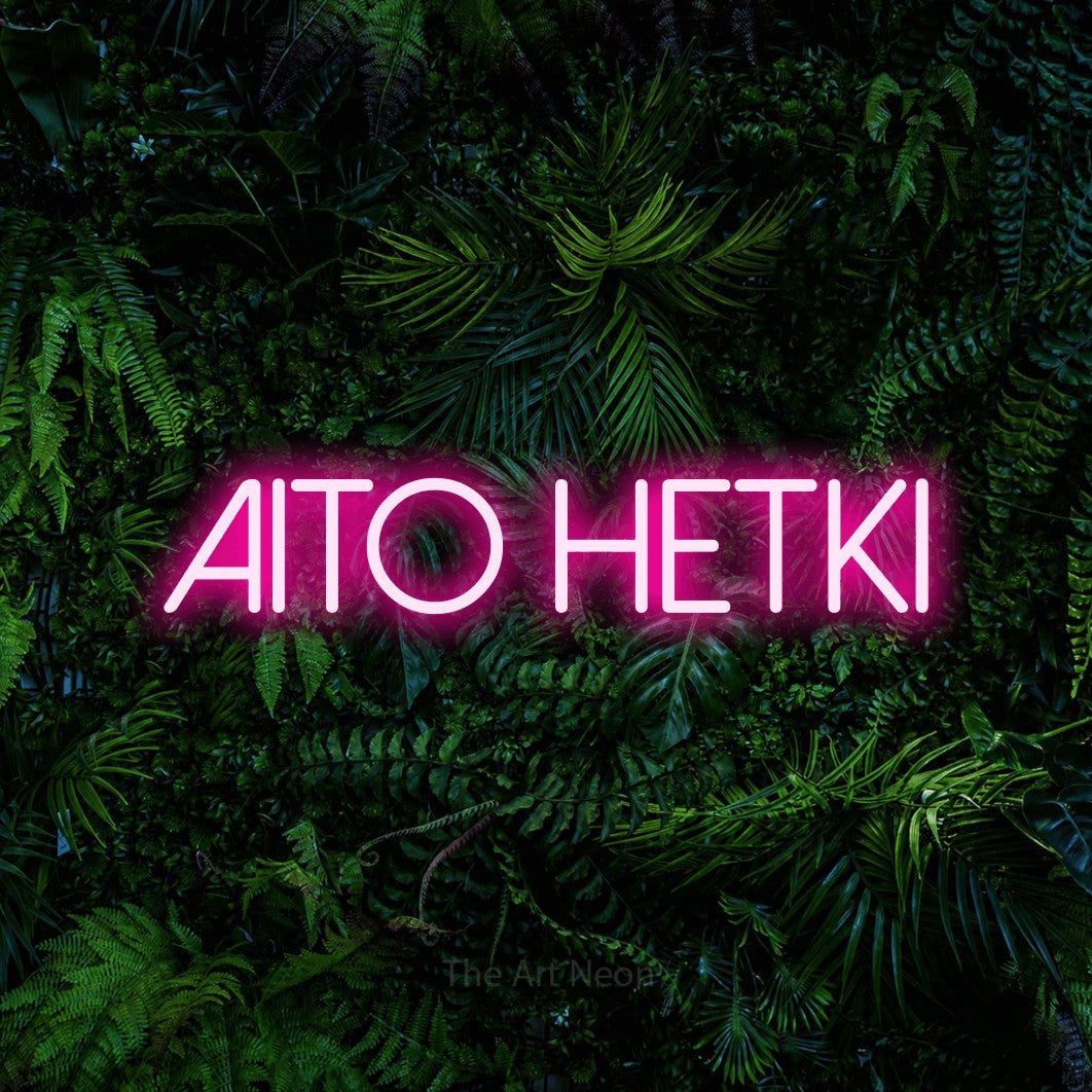 LED neon sign reading “Aito hetki”, arranged in a single line.