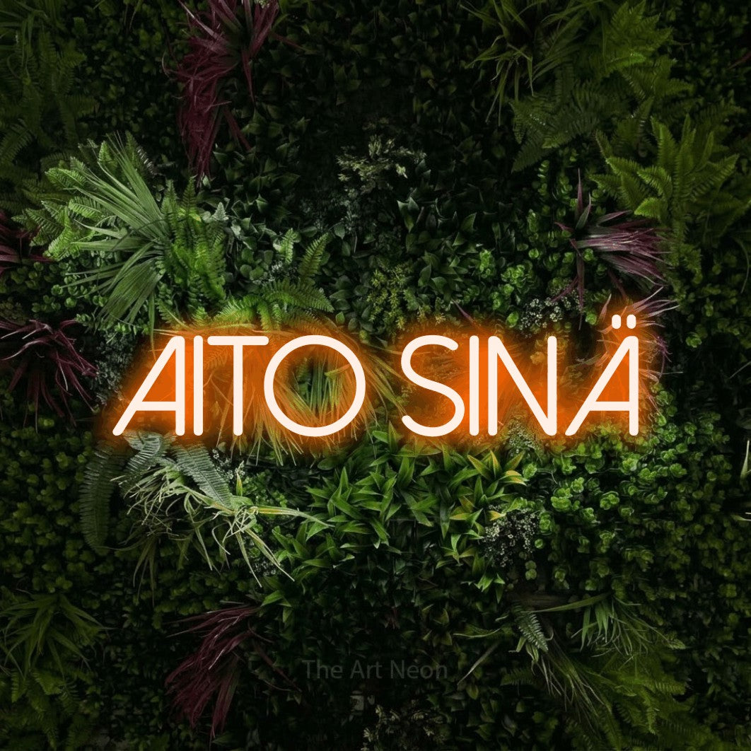 LED neon sign reading “Aito sinä”, arranged in a single line.