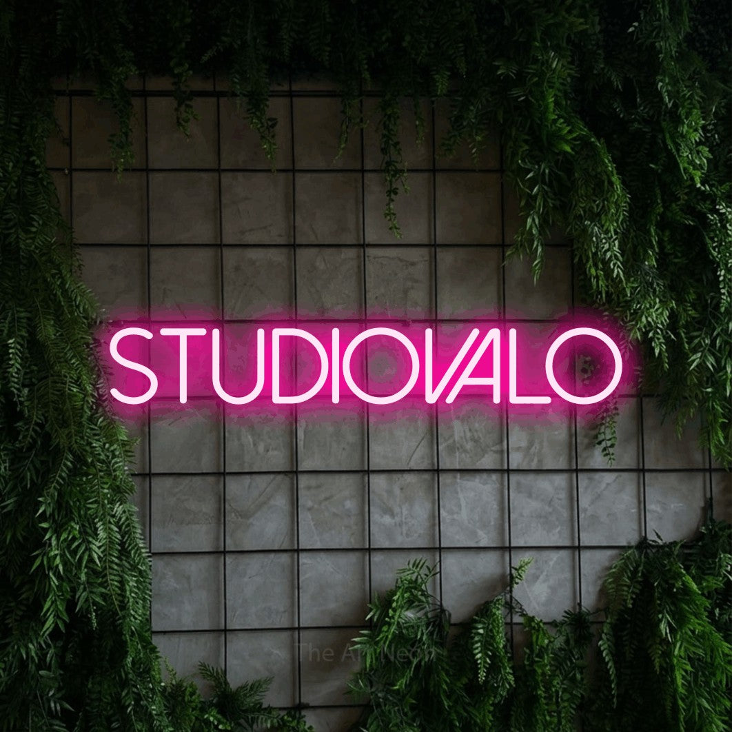 LED neon sign reading “STUDIOVALO”, arranged in a single line.