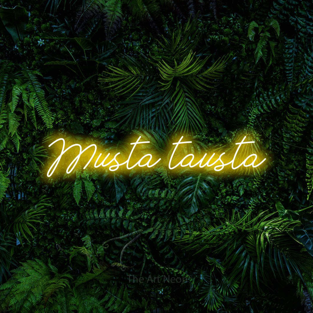 LED neon sign reading “Musta tausta”, arranged in a single line.