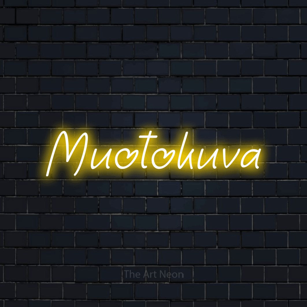LED neon sign reading “Muotokuva”, arranged in a single line.