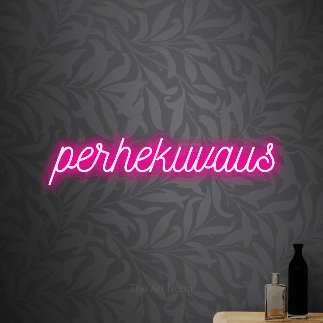 LED neon sign reading “perhekuvaus”, arranged in a single line.