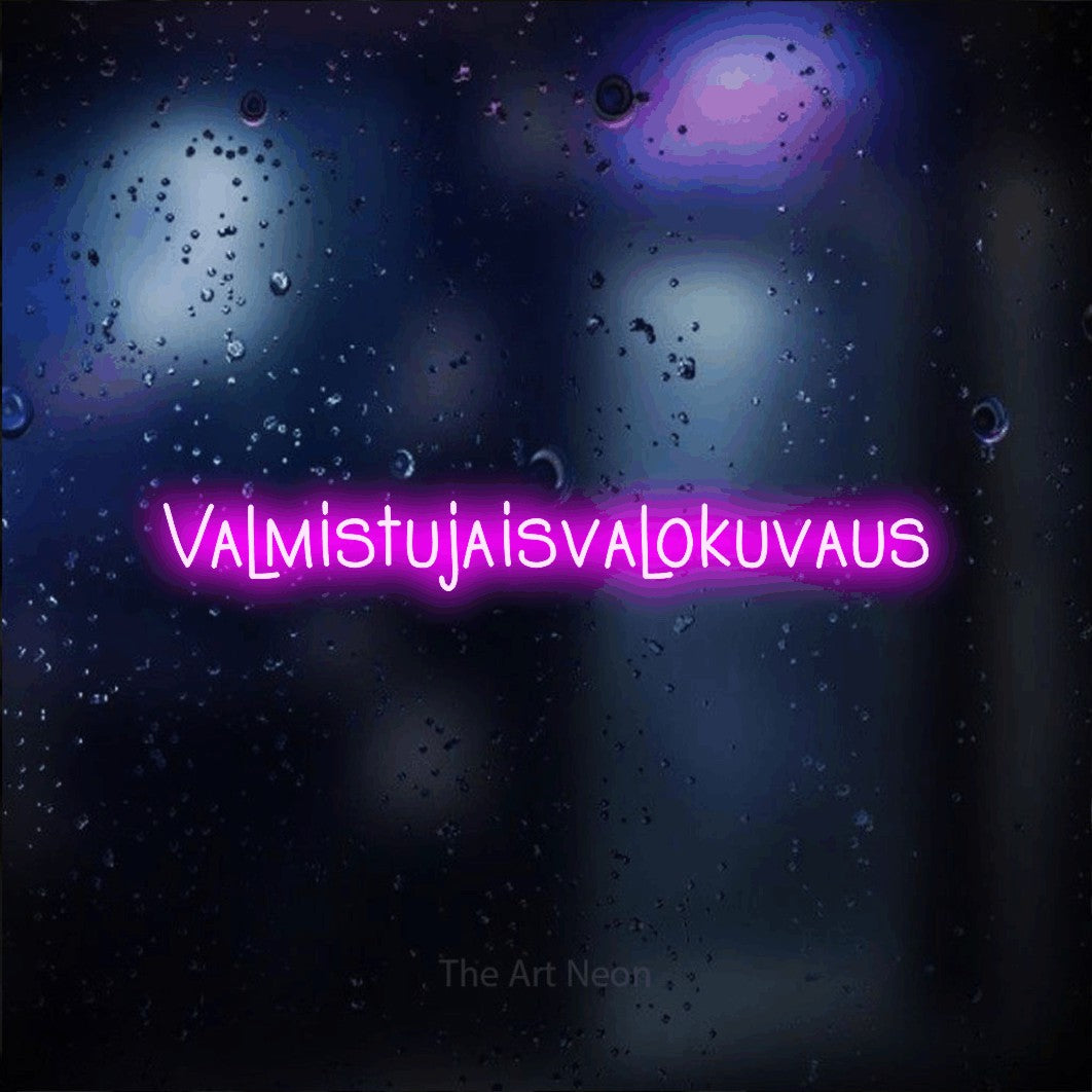 LED neon sign reading “Valmistujaisvalokuvaus”, arranged in a single line.