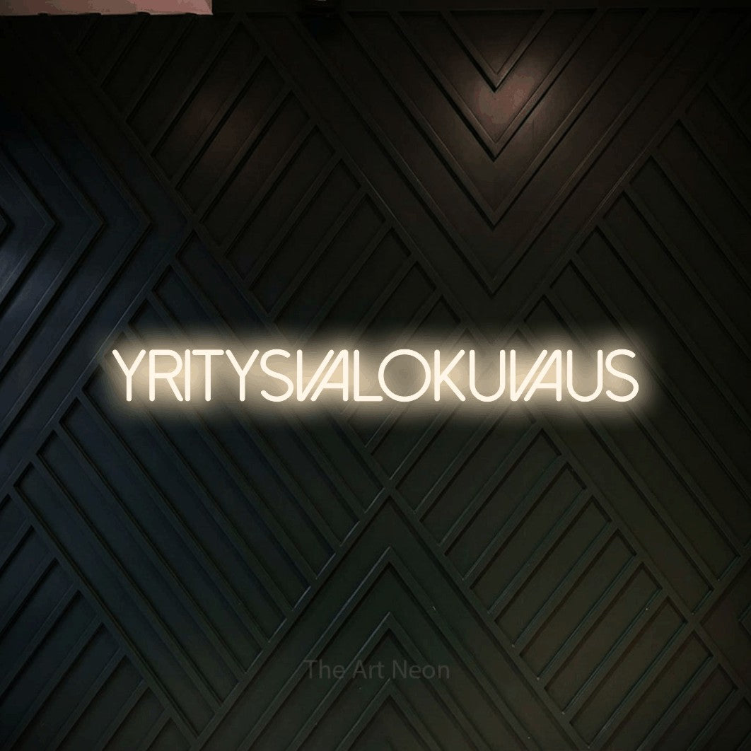 LED neon sign reading “YRITYSVALOKUVAUS”, arranged in a single line.