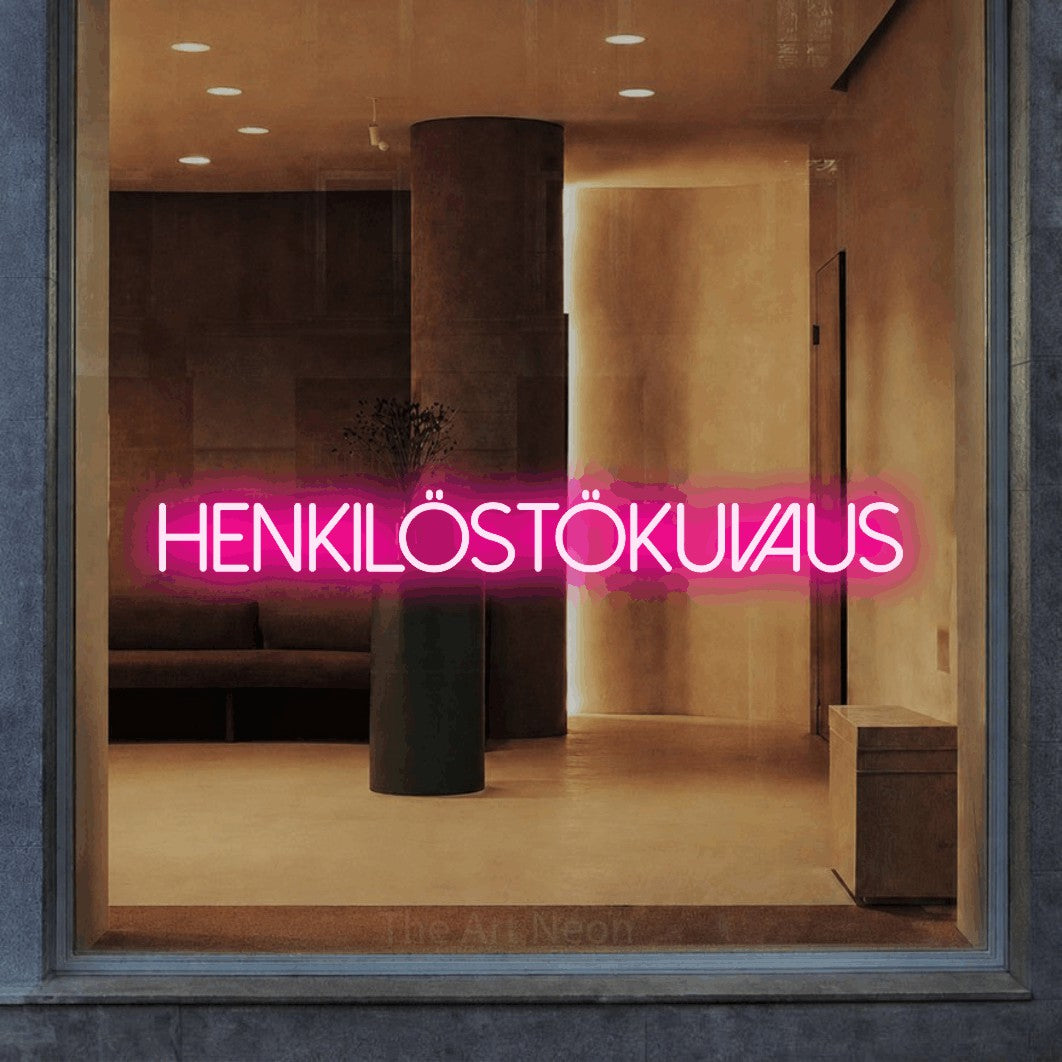 LED neon sign reading “Henkilöstökuvaus”, arranged in a single line.
