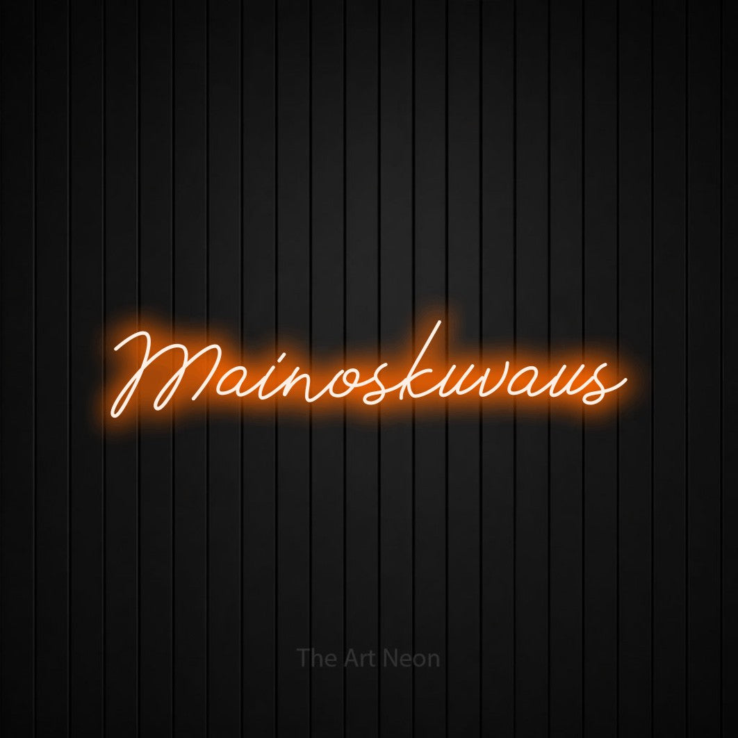 LED neon sign reading “Mainoskuvaus”, arranged in a single line.
