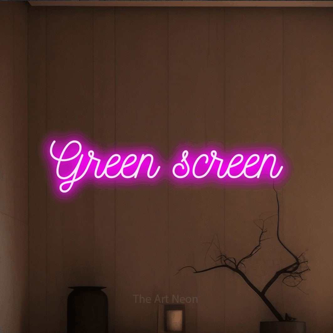 LED neon sign reading “Green screen”, arranged in a single line.