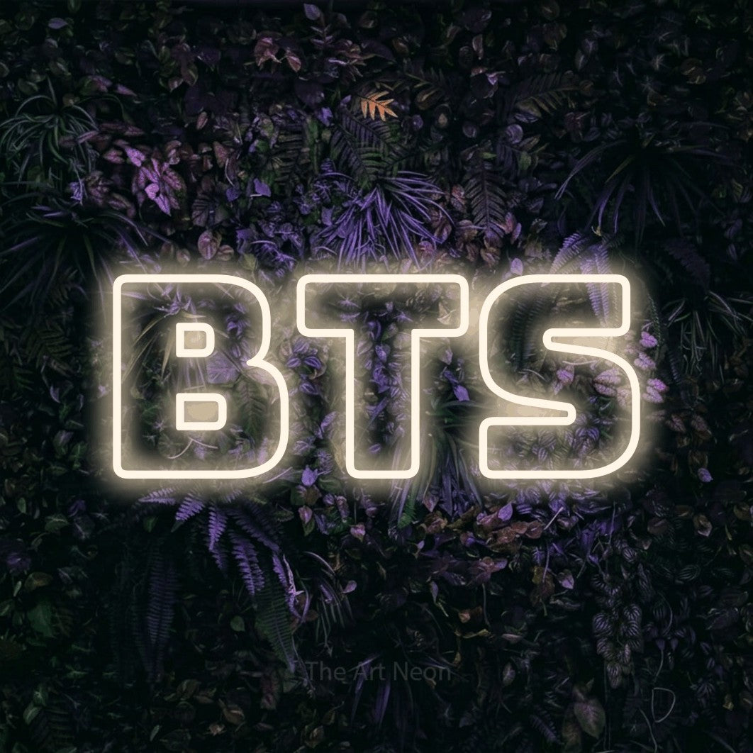 LED neon sign reading “BTS”, arranged in a single line.