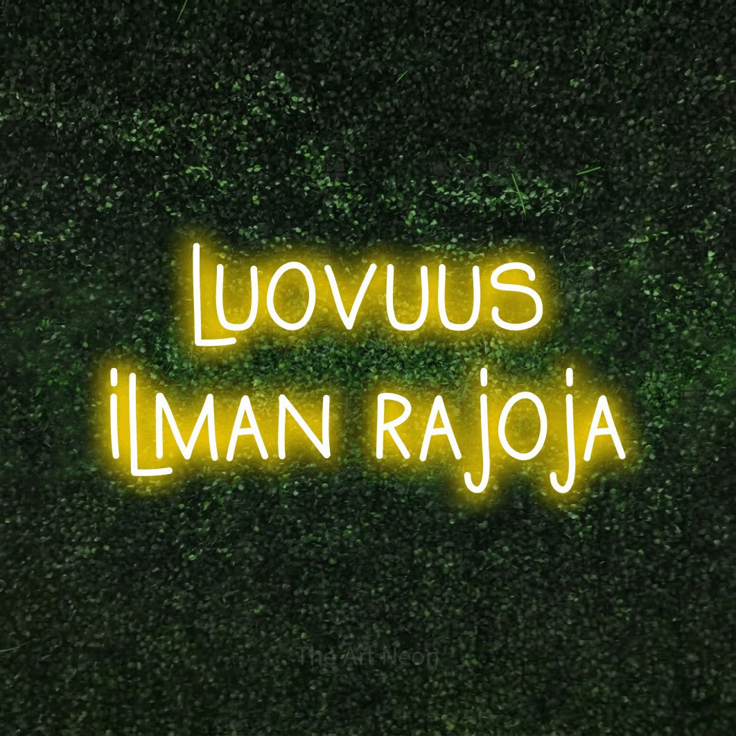 LED neon sign reading “luovuus ilman rajoja”, arranged in 2 lines.