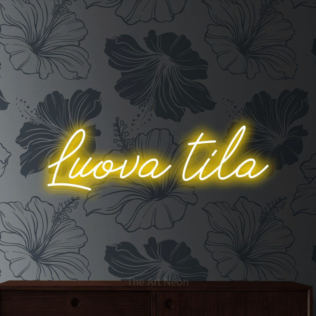 LED neon sign reading “Luova tila”, arranged in a single line.