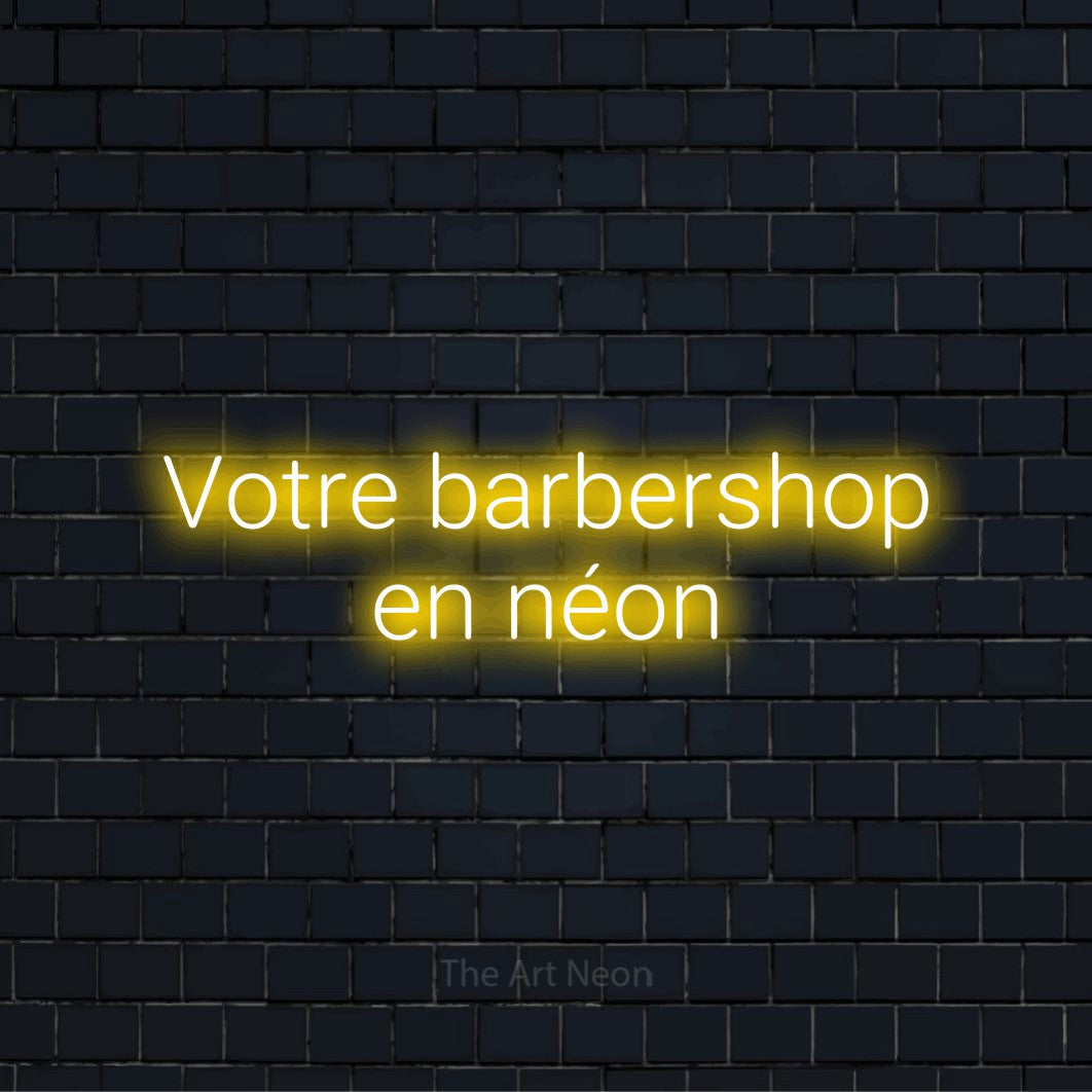 Enseigne néon personnalisée « Votre barbershop en néon » sur un mur en briques noires