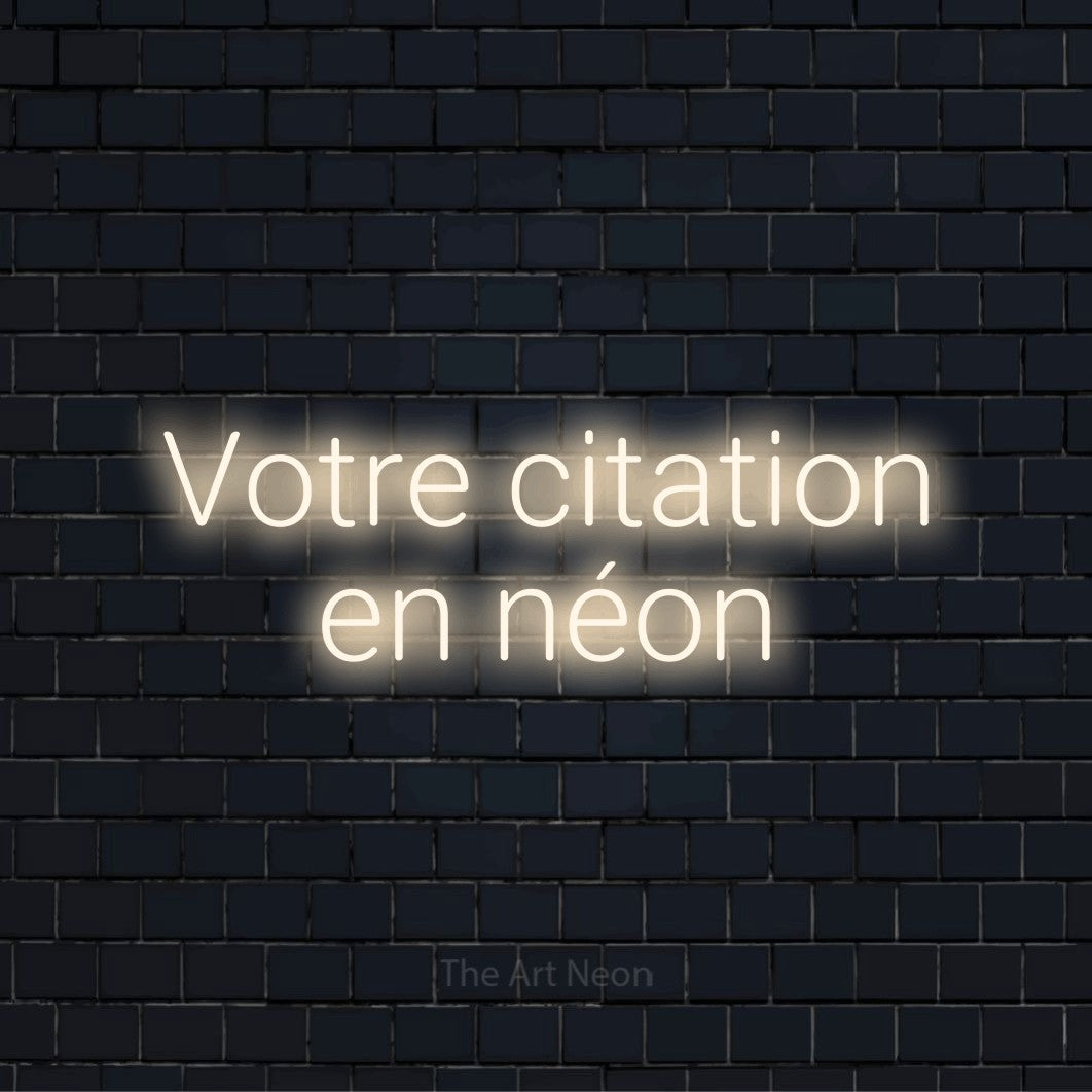 Enseigne néon personnalisée « Votre citation en néon » sur un mur en briques noires