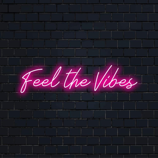 Custom LED neon sign reads Feel The Vibes, perfect for vibrant and personalized neon quote decor.