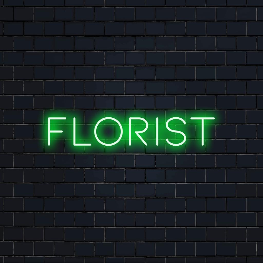 Custom LED neon sign featuring a bespoke floral design, perfect for unique neon light decor in any setting.