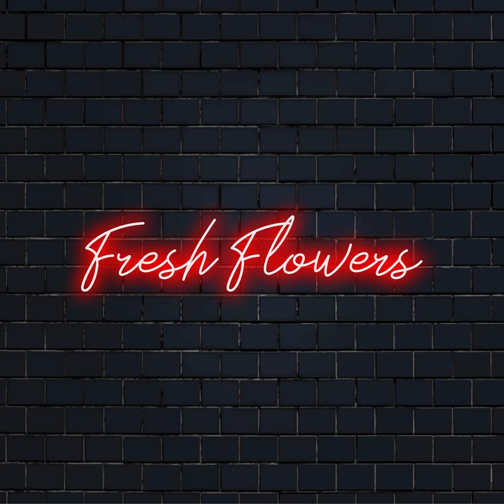 Valaistu Fresh Flowers -neonkyltti, jossa on kirkkaat mukautetut LED-kirjoitukset, jotka sopivat täydellisesti eloisaan neoniseen sisustukseen.