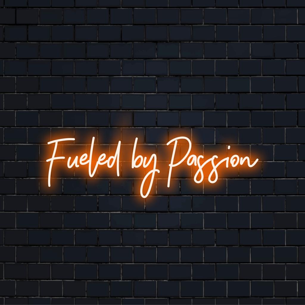 Vibrant handcrafted LED neon sign displaying Fueled By Passion, perfect for adding a personalized touch to your space.