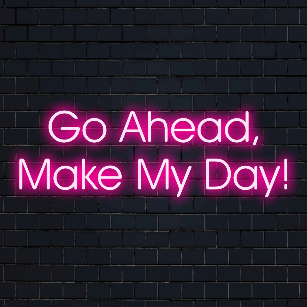Mukautettu LED-neonkyltti, joka korostaa Go Ahead, Make My Day eloisissa neonsävyissä. Täydellinen korostamaan mitä tahansa tilaa tyylillä.