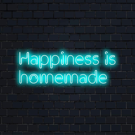 Happiness Is Homemade neon sign casting warm, inviting glow. Perfect personalized LED decor for home or events.