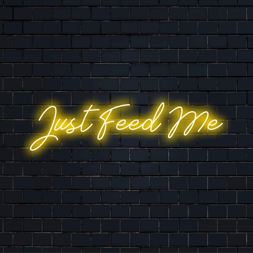 Elävä LED-neontaideteos, jossa lukee "Just Feed Me", joka sopii täydellisesti minkä tahansa tilan valaisemiseen rohkealla, mukautetulla neontyylillä.