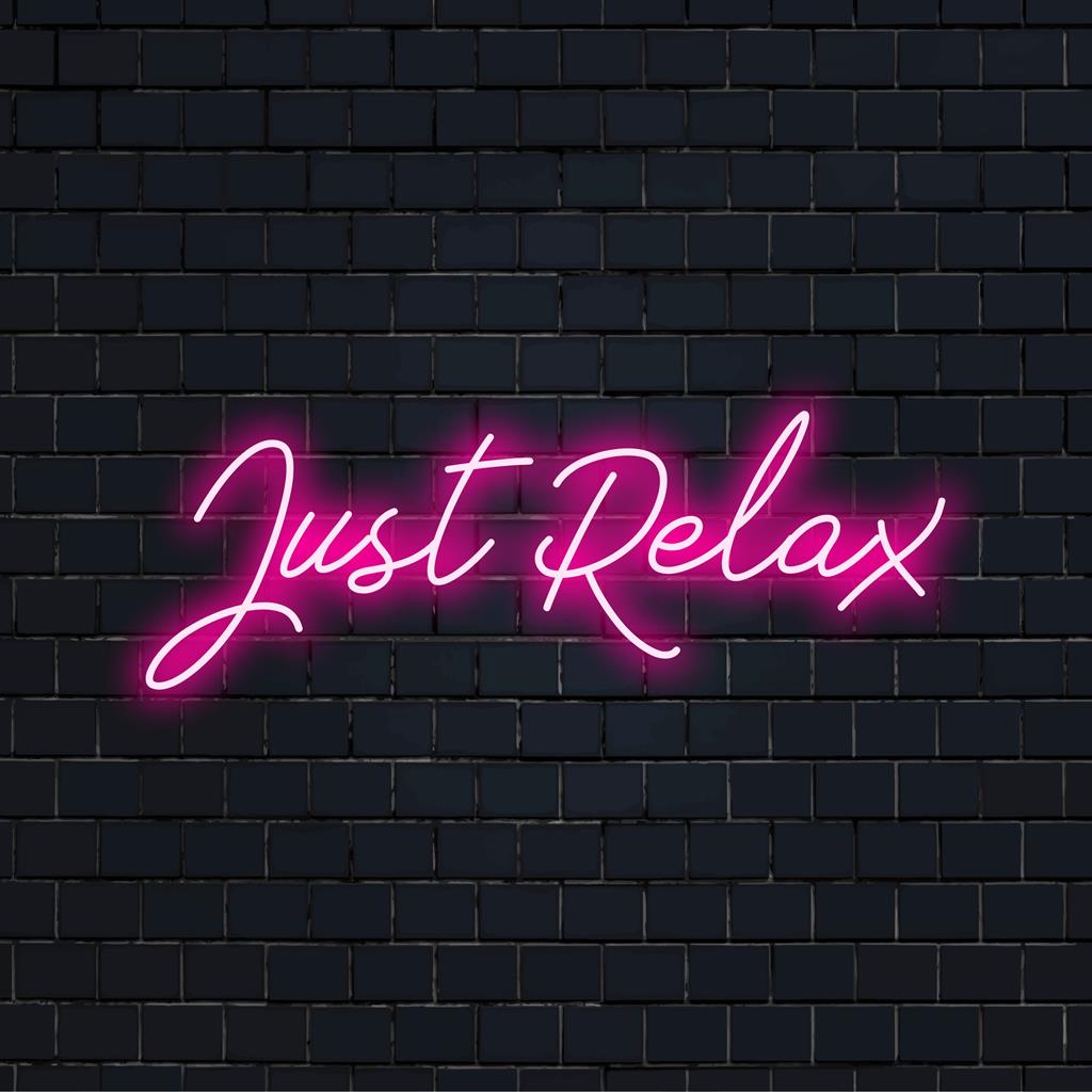 LED neon sign displaying Just Relax in elegant script; perfect for stress-relief and tranquil ambiance.