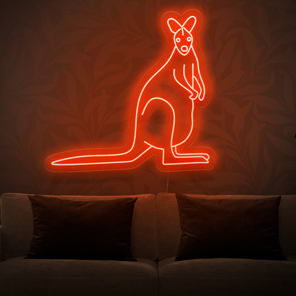 "Kangaroo Neon Sign" - Täytä tilaan leikkisä energia tällä valokyltillä esittelemällä iloista kengurua eloisissa väreissä. Täydellinen tiloihin, joissa juhlitaan iloa ja eloisuutta.