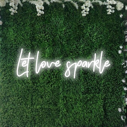 Illuminate your space with the Let Love Sparkle Custom LED Neon Sign, bringing a touch of warmth and inspiration to any room.