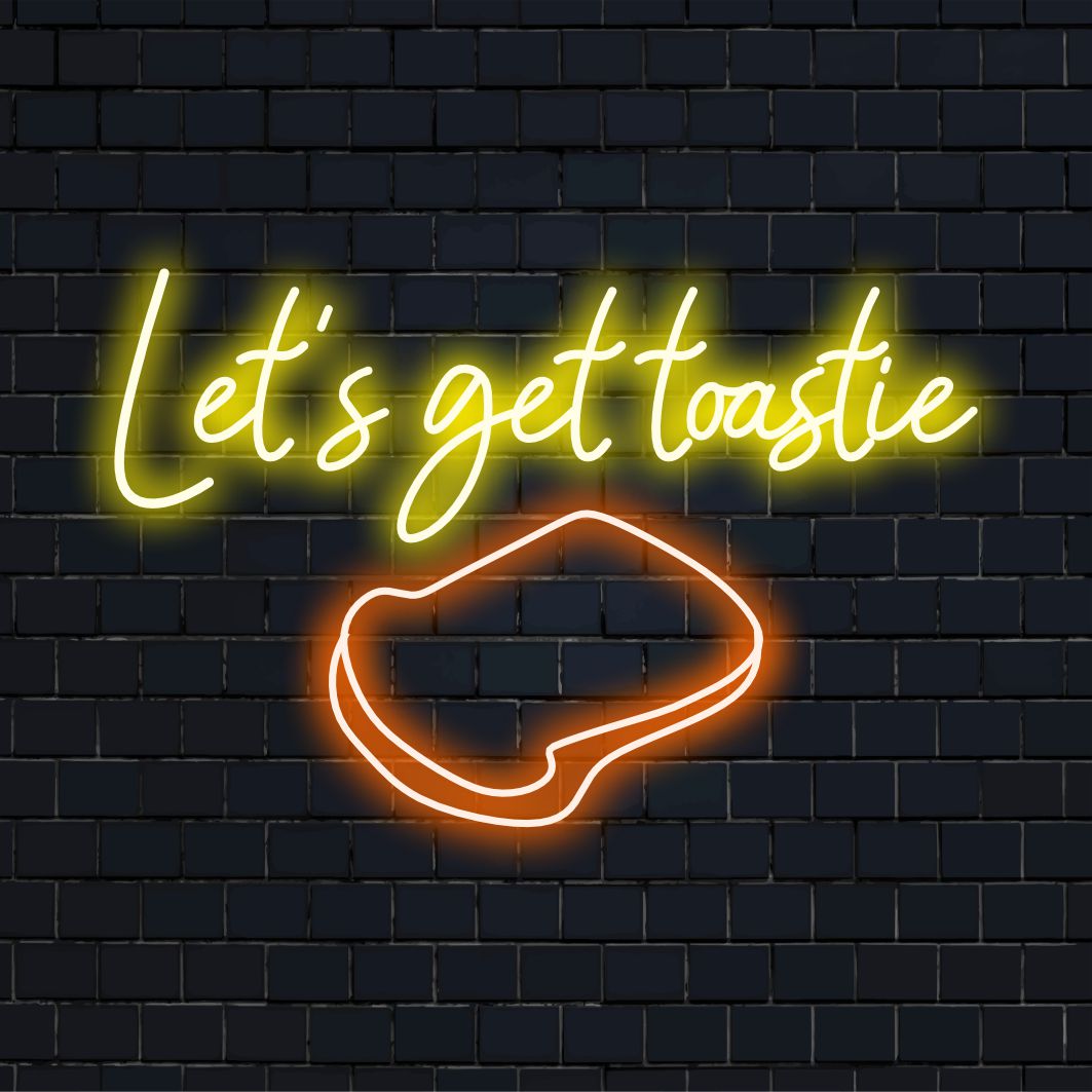 Let's Get Toastie -valokyltti, jossa on käsintehty LED-neonteksti lämpimään ja kutsuvaan sisustukseen.