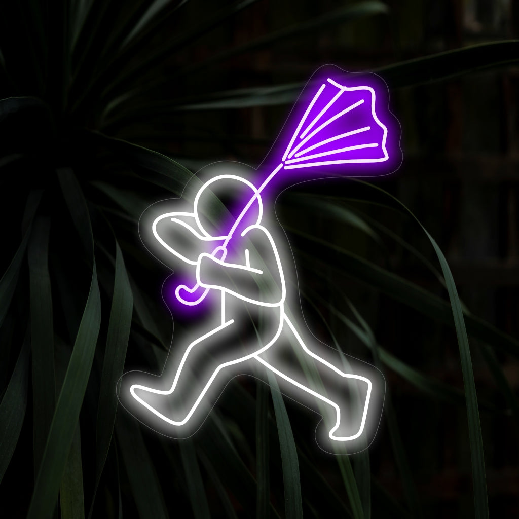 "Man Tries To Hold His Umbrella Neon Sign" on omituinen ja humoristinen lisäys tiloihin, joissa on ripaus omituista. Valaise leikkisällä tunnelmalla!