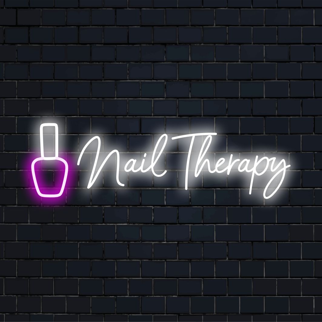 Custom LED neon sign spelling Nail Therapy in vibrant colors, perfect for salon decor and personalized neon ambiance.