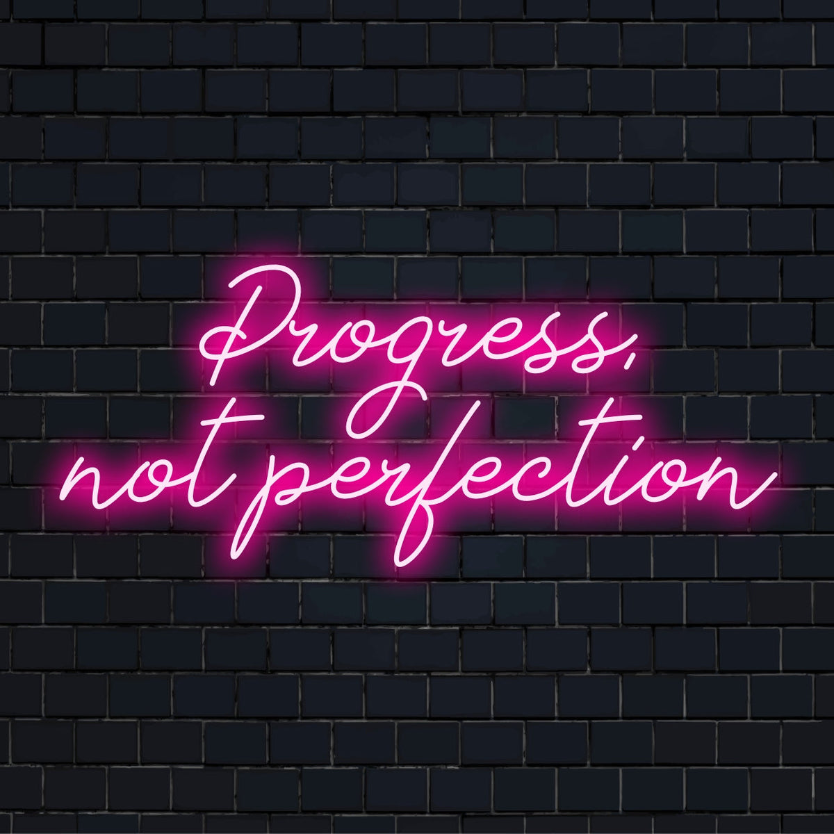 Käsintehty LED-neonkyltti, jossa on Progress, Not Perfection eloisissa väreissä ��� inspiroiva yksilöllinen valosisustus.