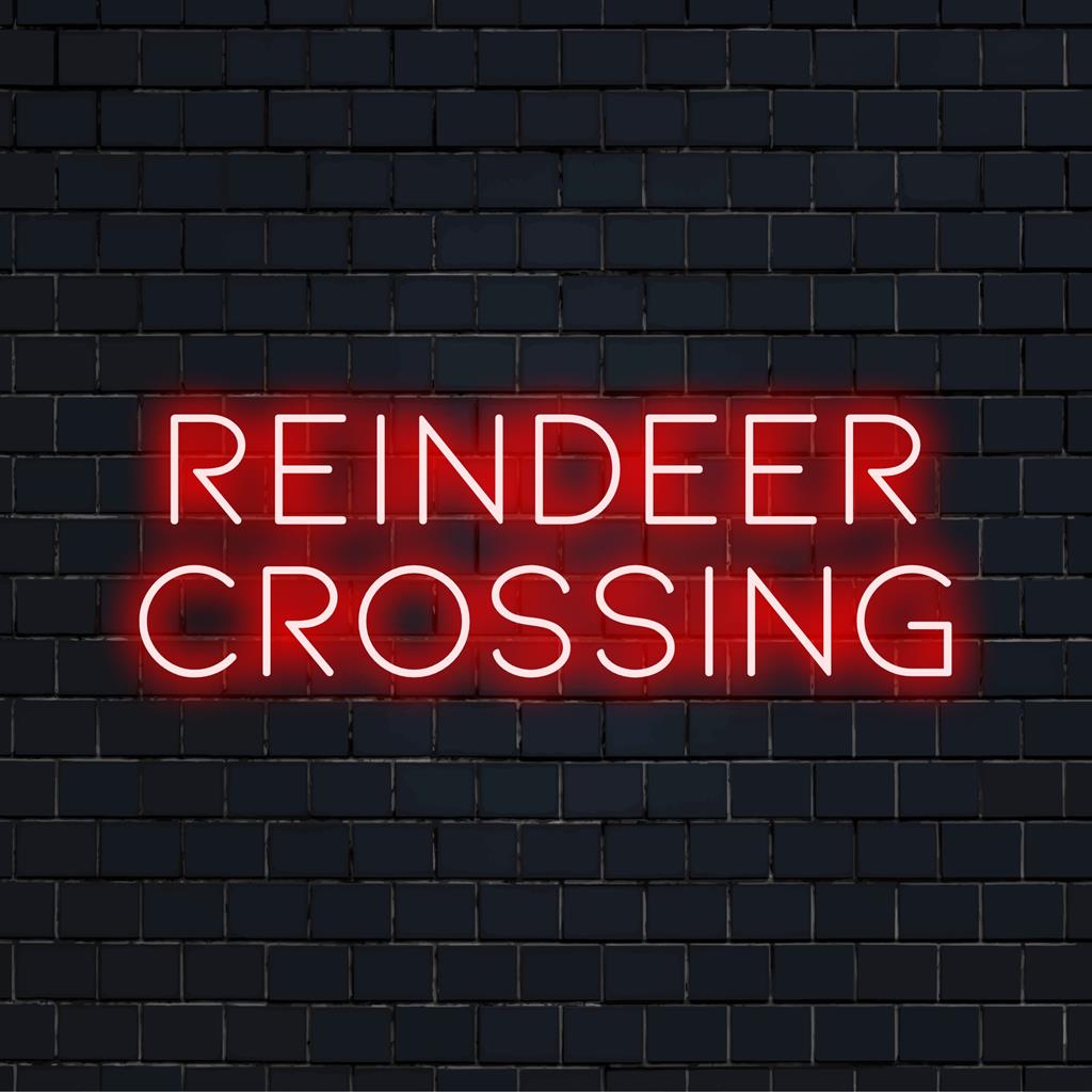 A vibrant Reindeer Crossing neon sign offering festive glow, perfect for holiday decor with a modern LED touch.