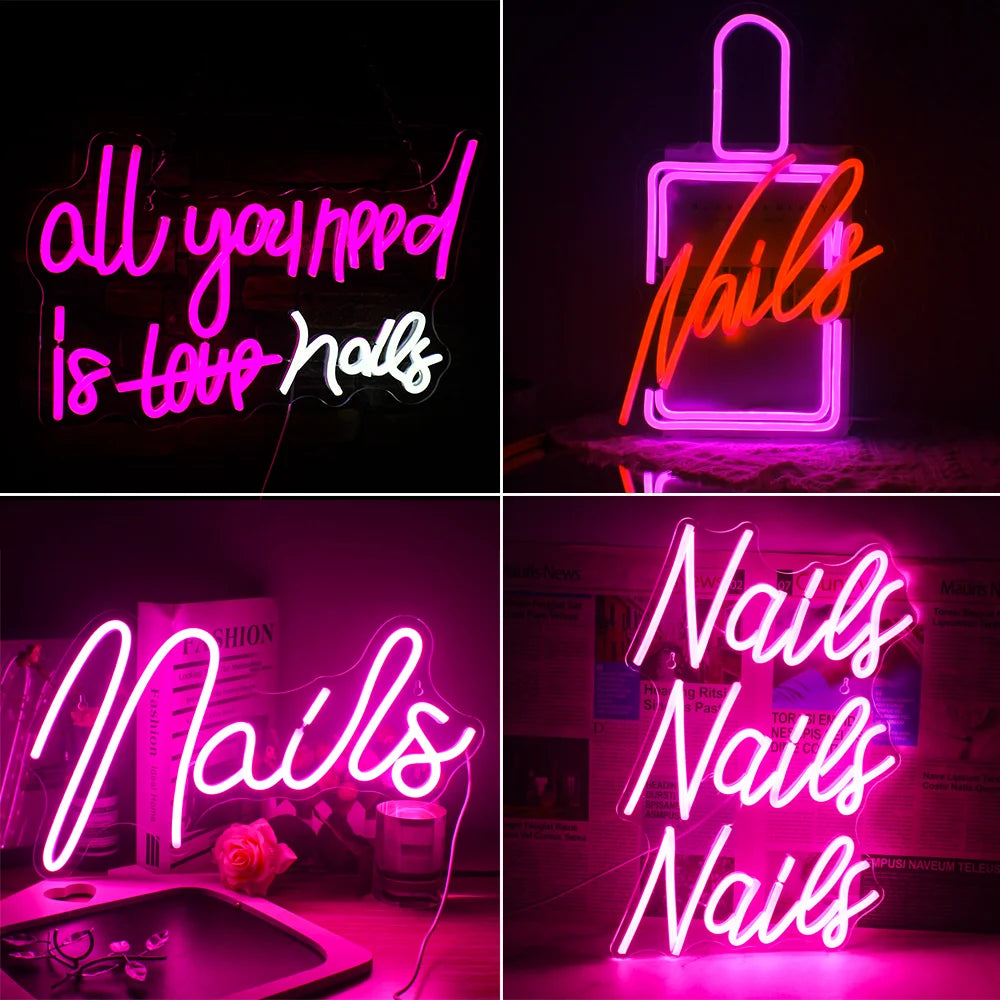 Kuvassa on eloisa LED-valokyltti, jossa näkyy teksti "All you need is nails" esteettisesti miellyttävällä fontilla.