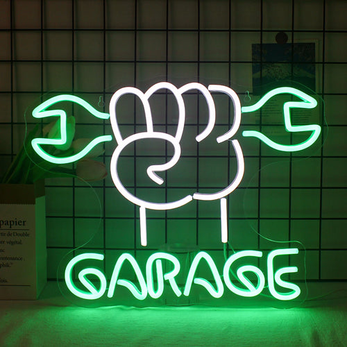 En levande LED-neonskylt med ordet "Garage" upplyst med djärva, iögonfallande bokstäver.
