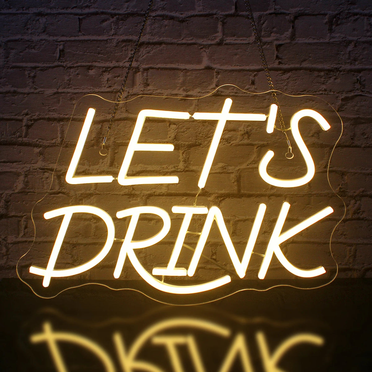 Eloisa LED-valokyltti, jossa sanat "Let's Drink" hehkuvat kirkkaan valkoisena.