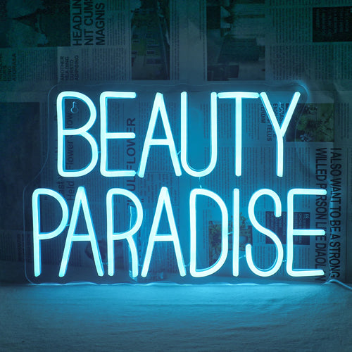 Kuvassa on eloisa käsintehty LED-valokyltti, jossa lukee "Beauty Paradise" tyylikkäillä kursiivikirjaimilla.