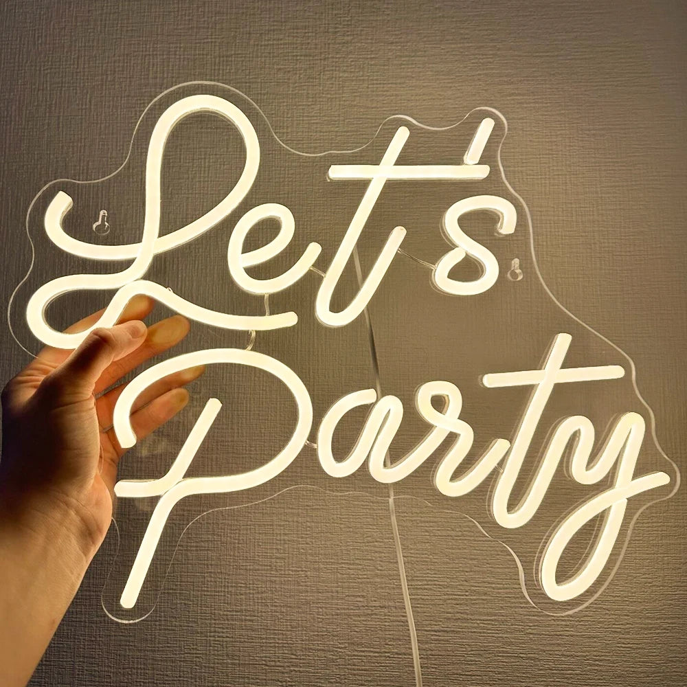Eloisa LED-valokyltti, jossa on lihavoitu ja kursiivinen teksti "Let's Party".
