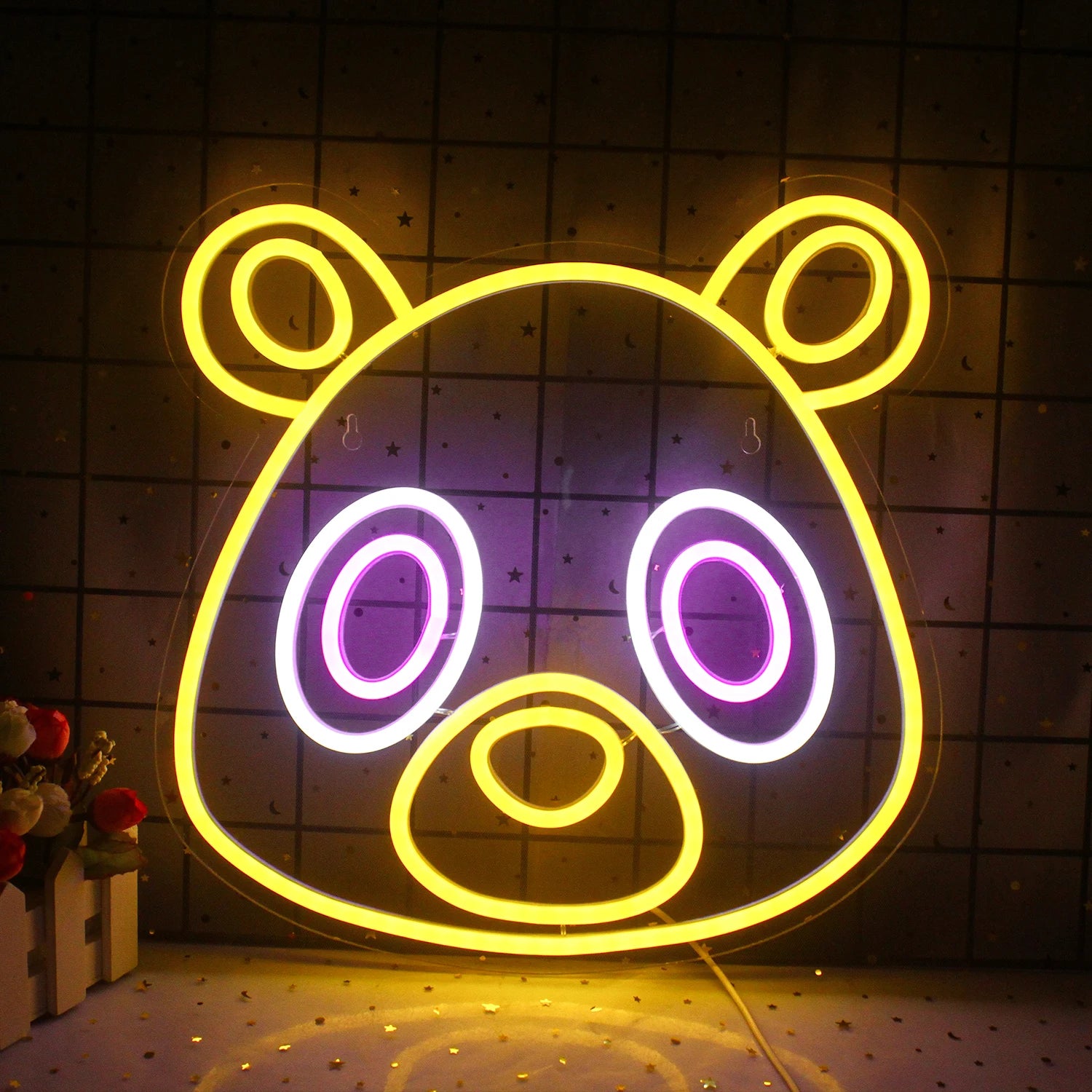 Image shows a vibrant, handmade LED neon sign in the shape of an adorable bear character inspired by anime art style.