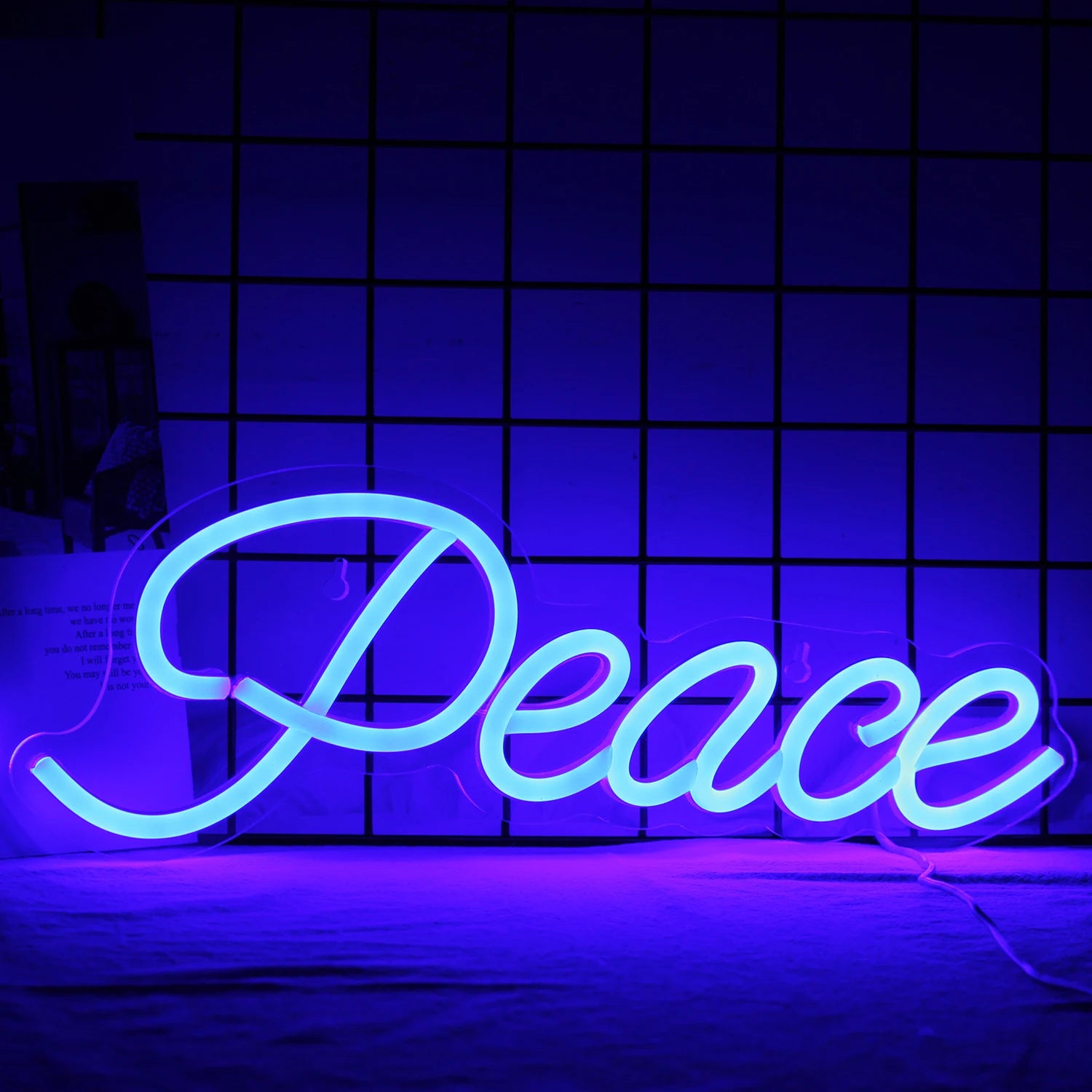 The image features a vibrant "Peace" LED neon sign, crafted in a bright white hue.